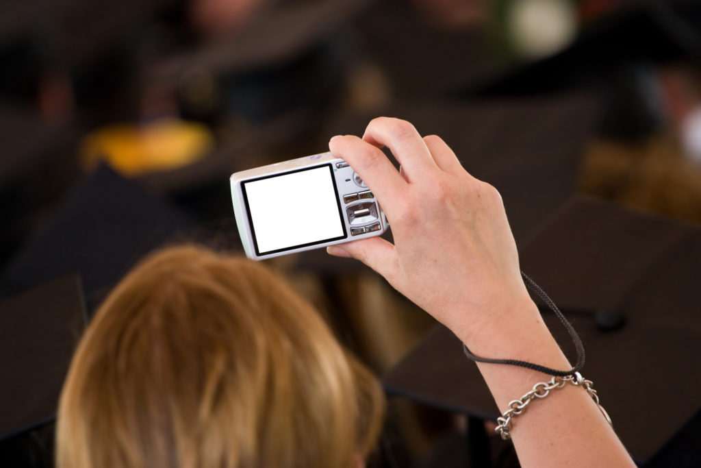 woman taking photo for marketing piece