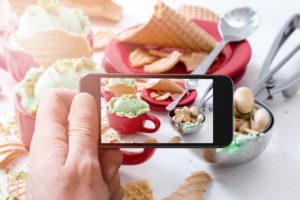 taking photo with phone for Instagram to get more followers
